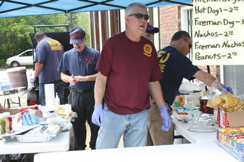 Notasulga Volunteer Fire Department fund raising with hot dogs, chips, drinks, and great sounds